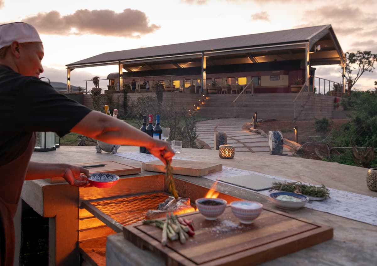 Chef preparing a barbecue at the Railway Carriage